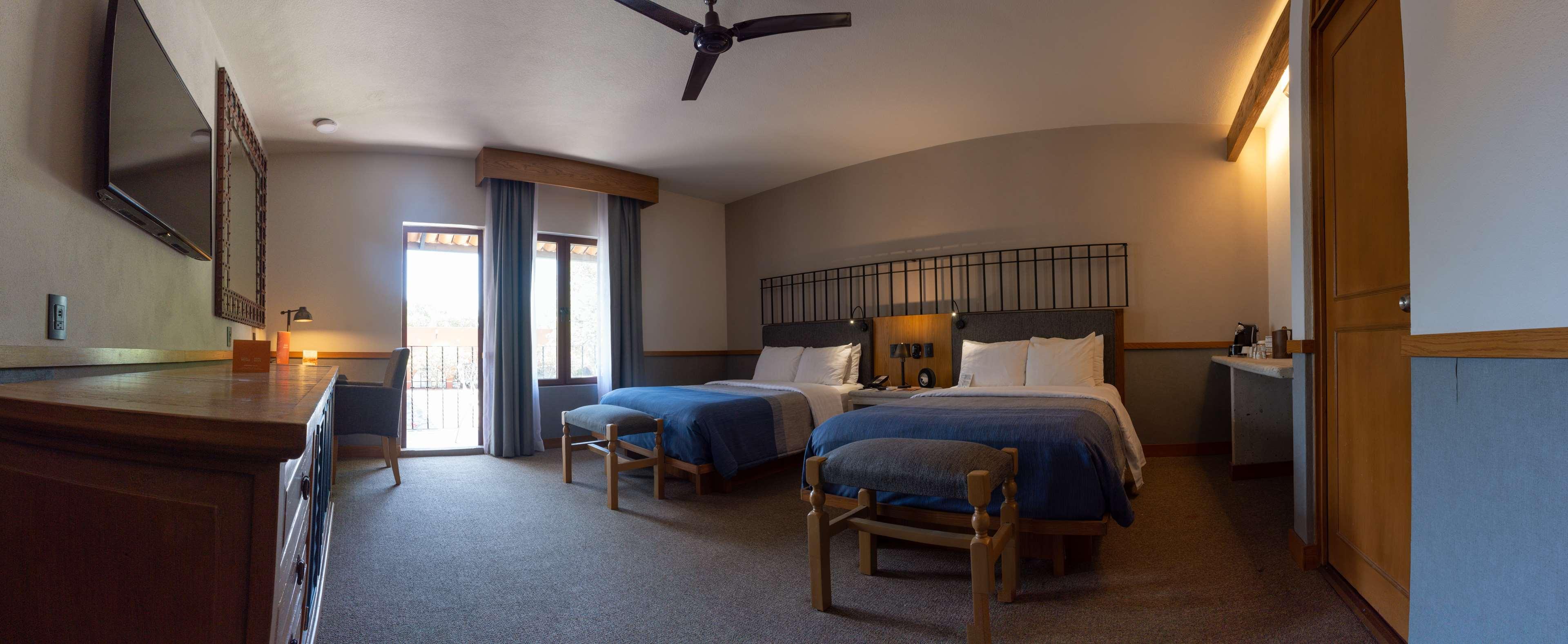 Hacienda Jurica By Brisas Hotel Querétaro Exterior foto A guest room at the Lodge at the Presidio