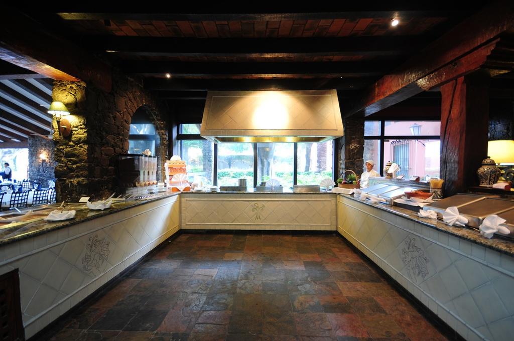 Hacienda Jurica By Brisas Hotel Querétaro Exterior foto The open kitchen at the restaurant
